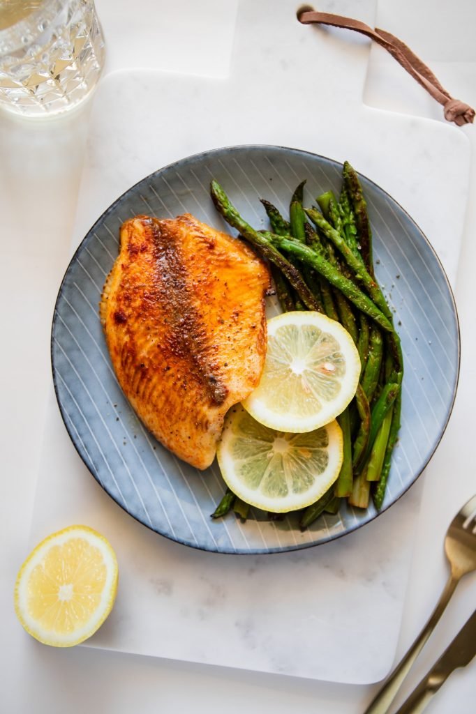 Baked tilapia fish with asparagus